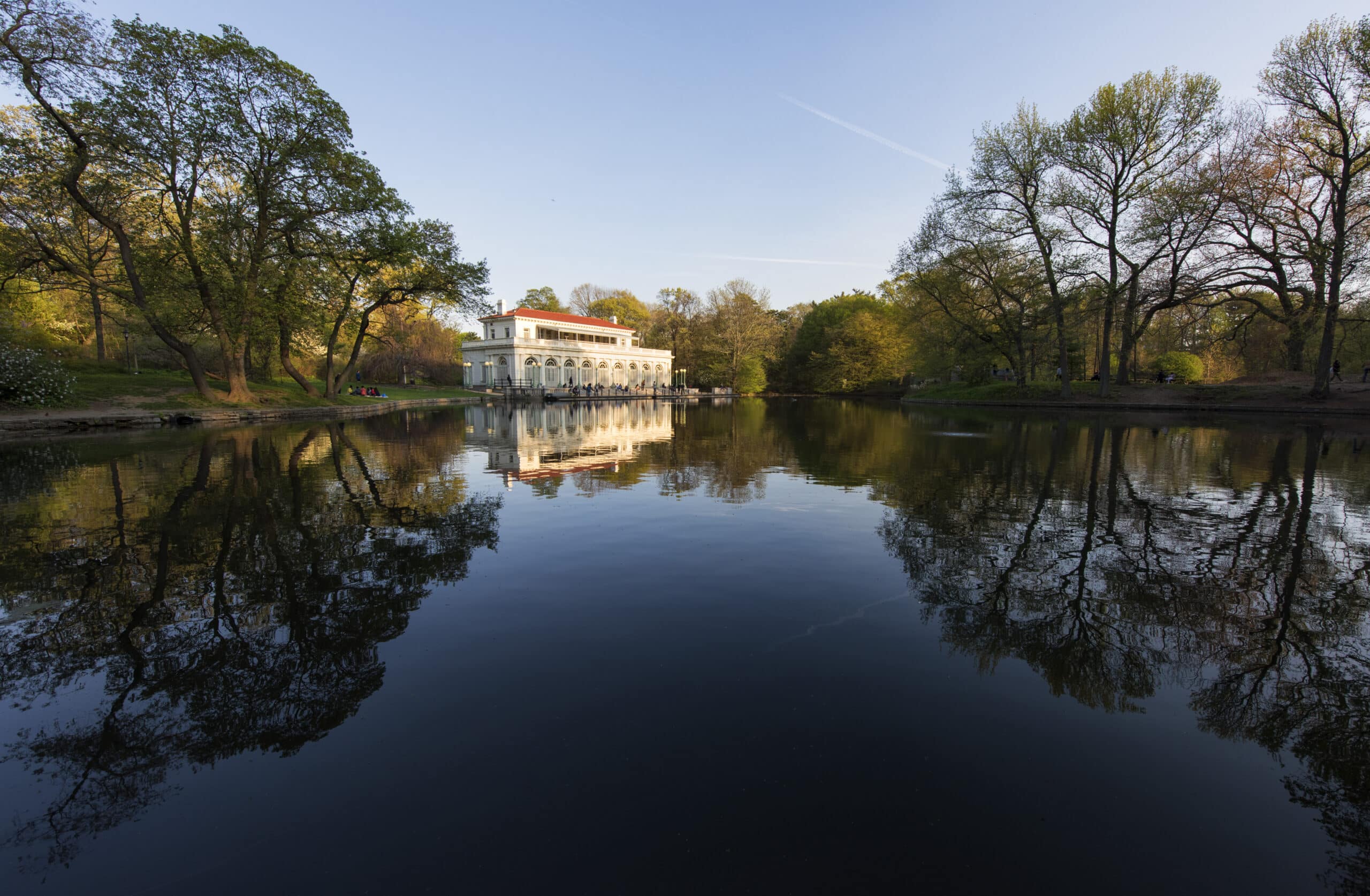 The Boathouse at the lullwater with a beautiful blue sky.