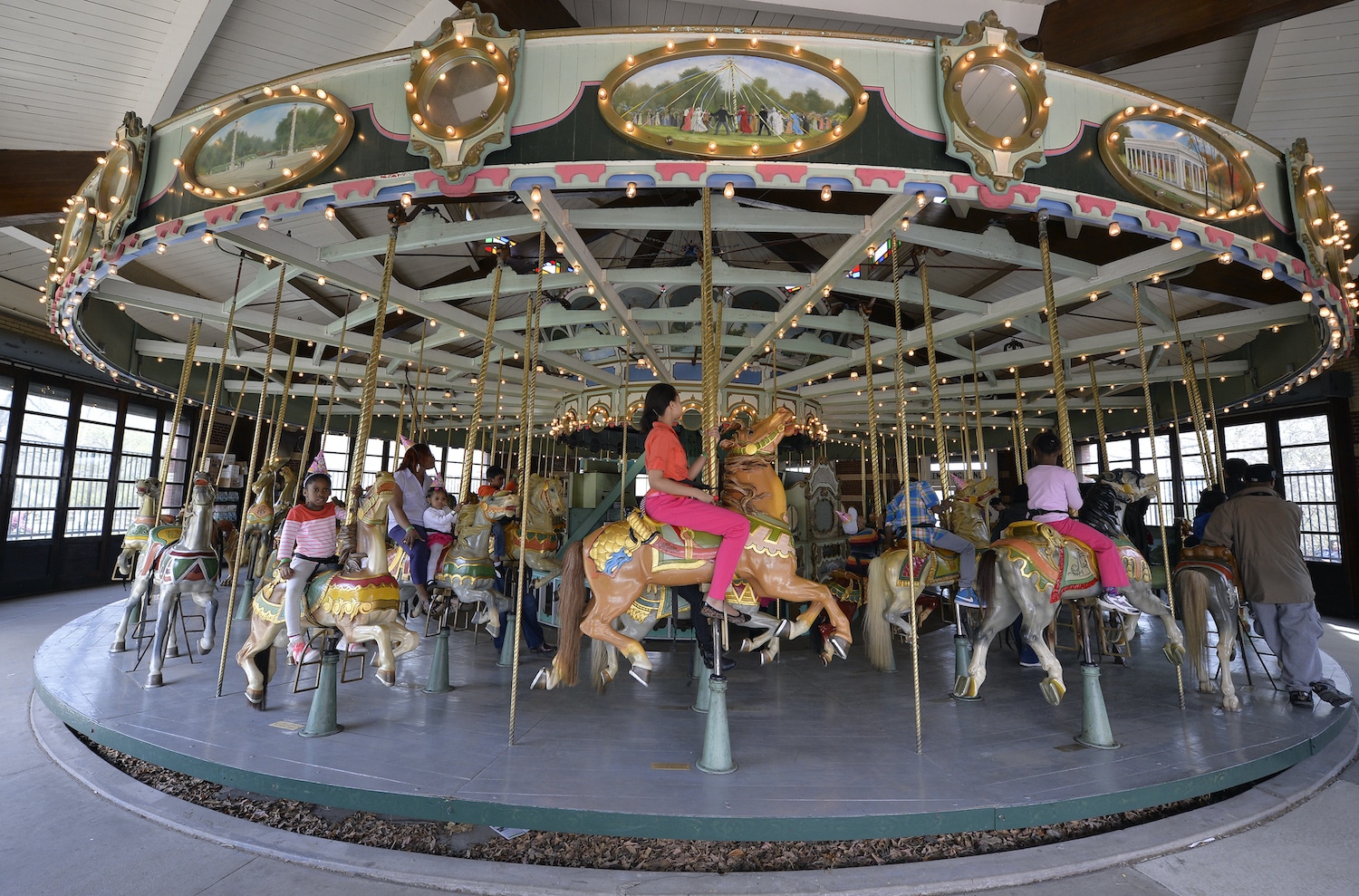 Youth riding the Carousel