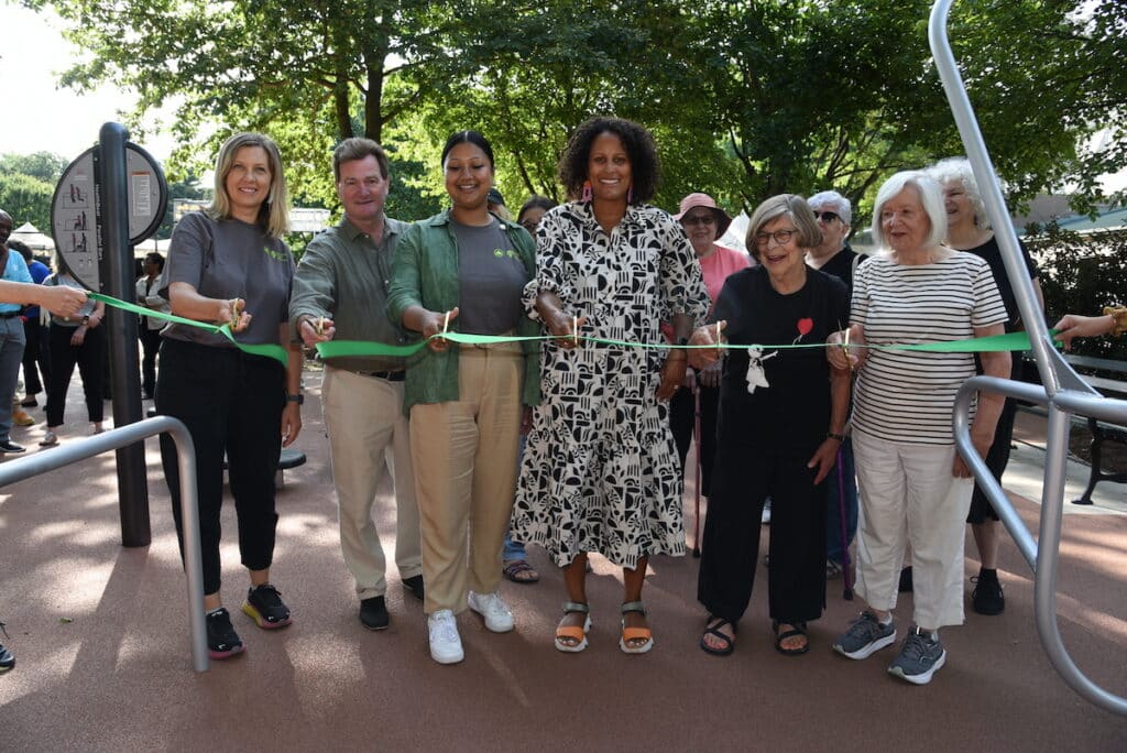 Left to right: Svetlana Ragulina, Senior Landscape Architect, Christian Zimmerman, Vice President, Capital and Landscape Management, Council Member Shahana Hanif, Morgan Monaco, President and Park Administrator, and two others cut the ribbon of the new Prospect Park adult fitness area.