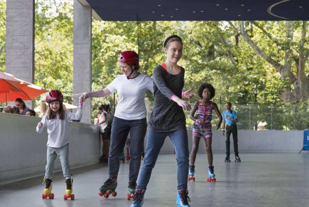 close up of people roller skating