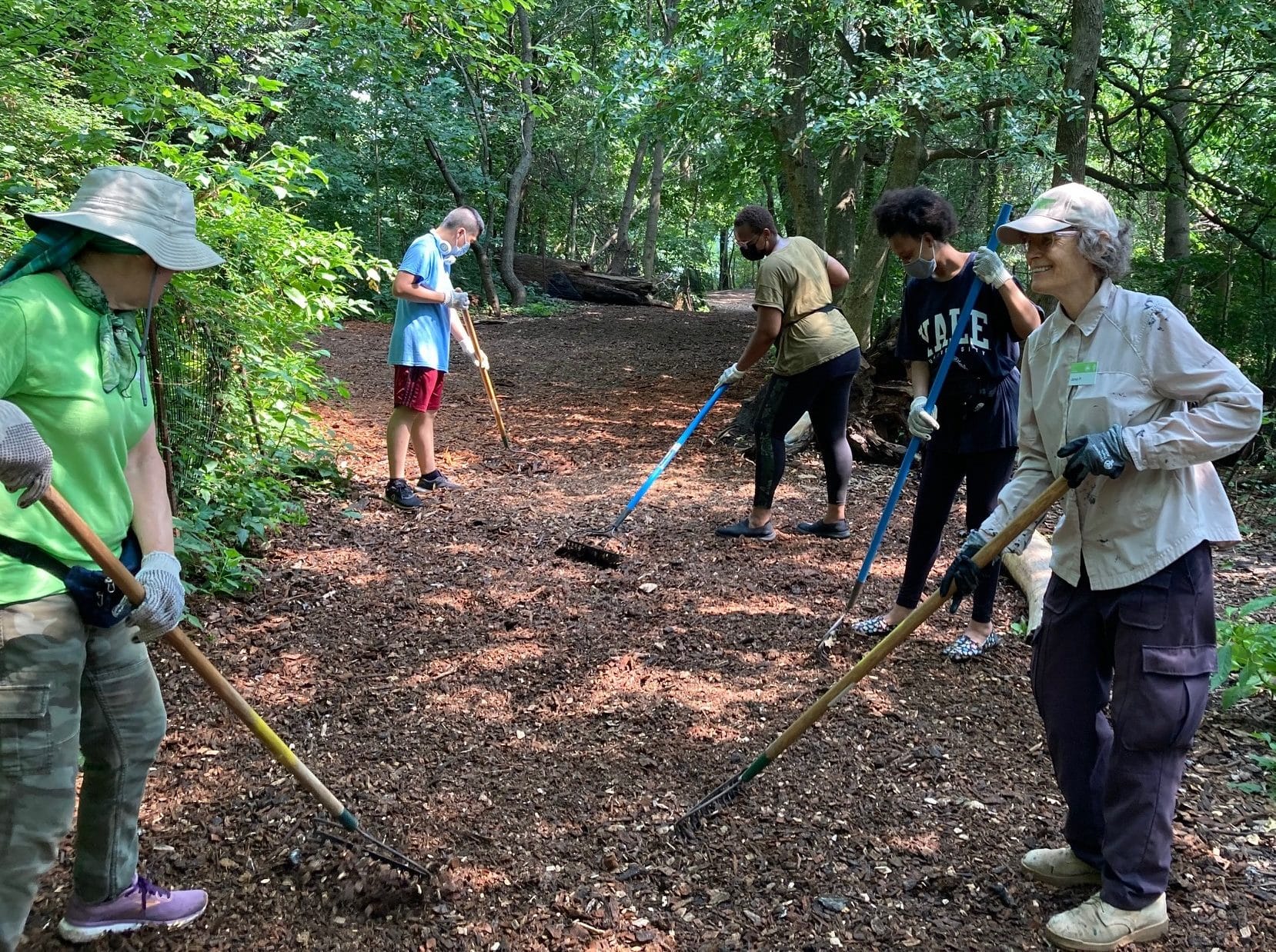 Volunteers Mulching Pathway